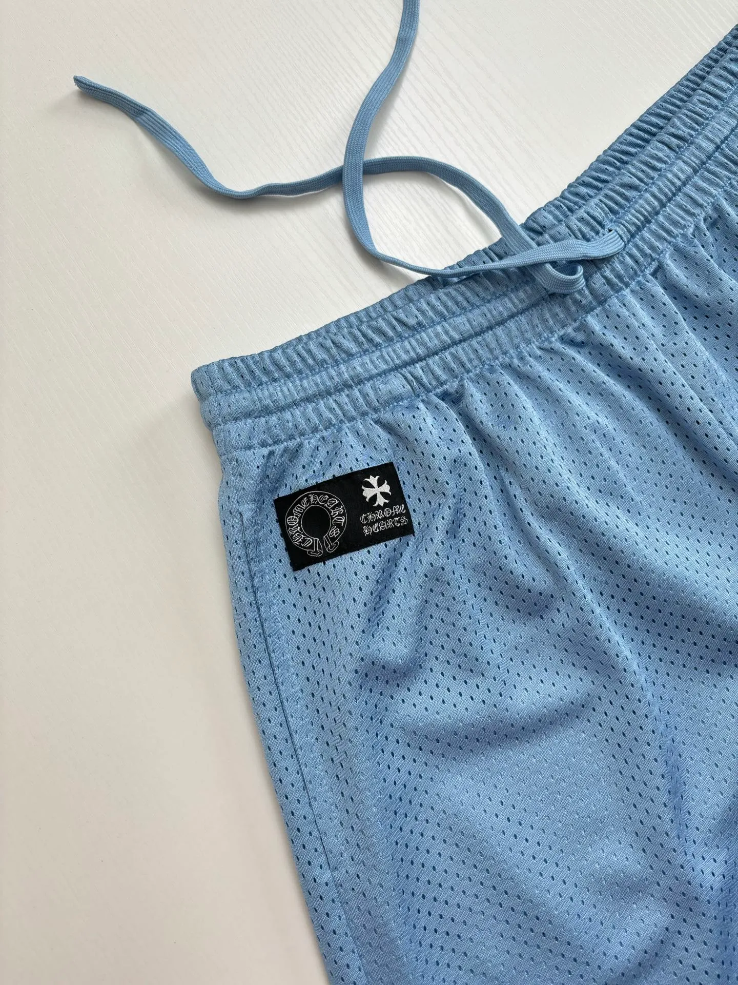 P260 Chrome Heart*/Ch Chrome Heart 25SS mesh glitter blue ice hockey shorts. The fabric is made of high-density 100D bird's eye cloth. Double-sided mesh positioning is very time-consuming. The cost of labor loss is very high. It is not a single-layer thin transparent bottom junk product on the market. Same style for men and women. OS version Size: S/M/L